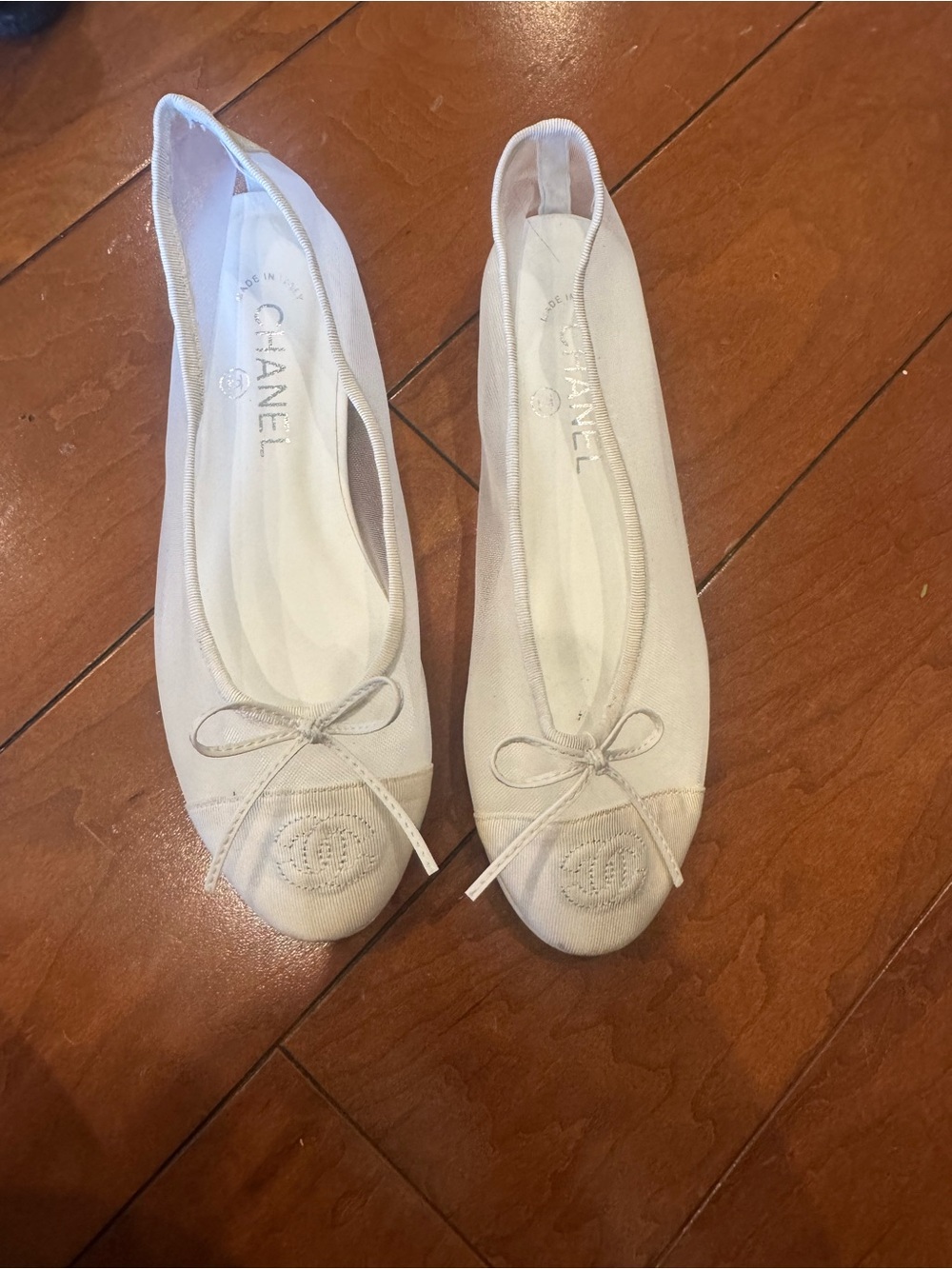 CHANEL Ivory Canvas Ballet Flats with CC Medallion